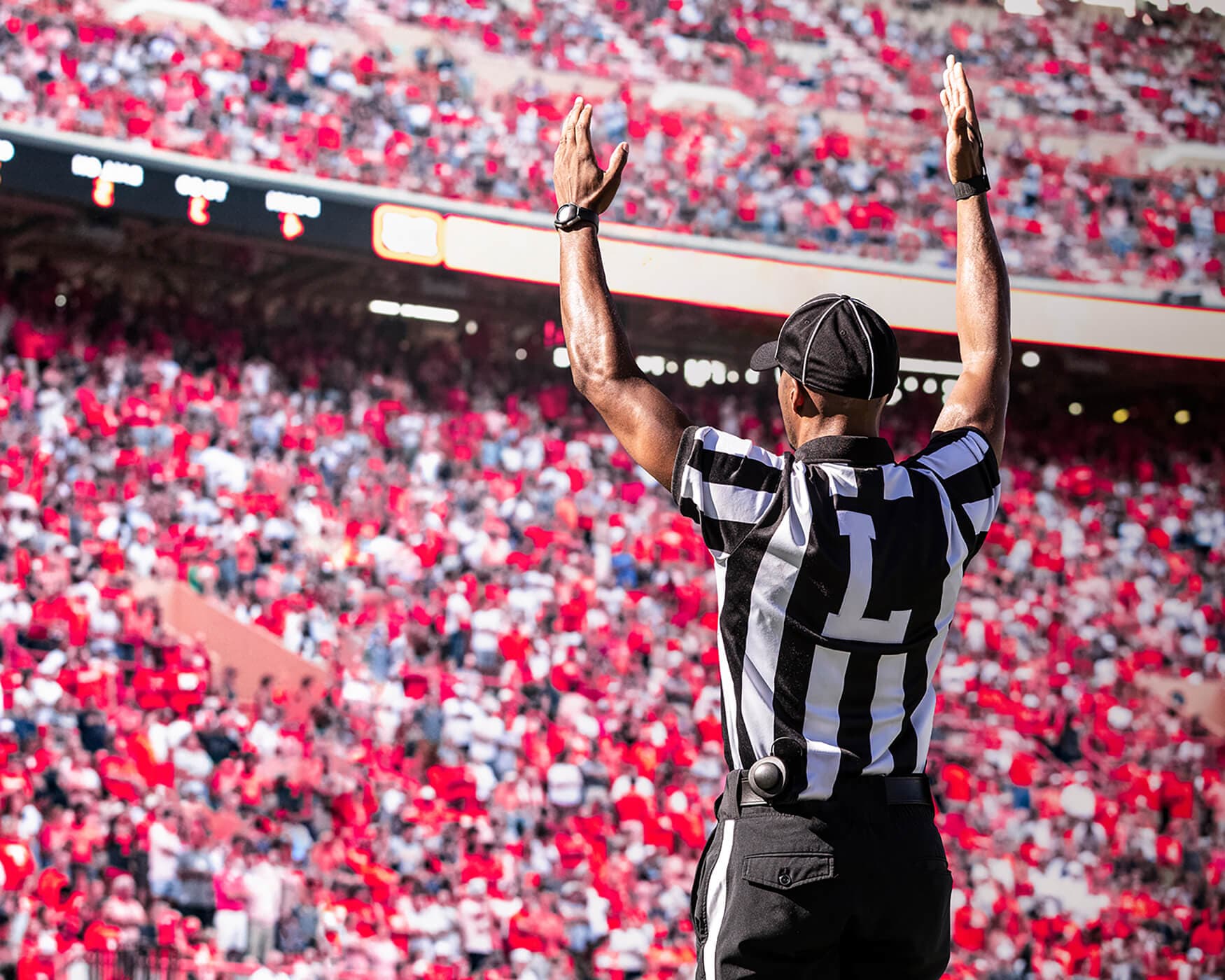Photo of a referee calling a touchdown